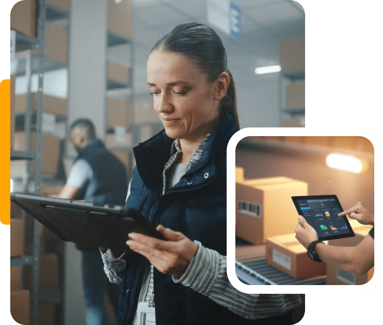 Woman using tablet in warehouse environment.