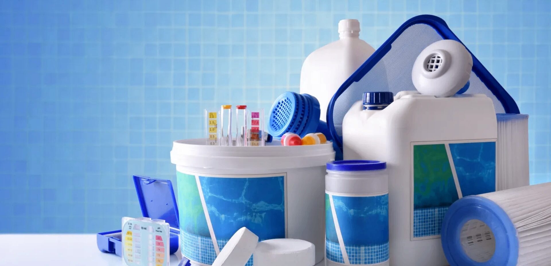 Pool cleaning supplies on a blue background.