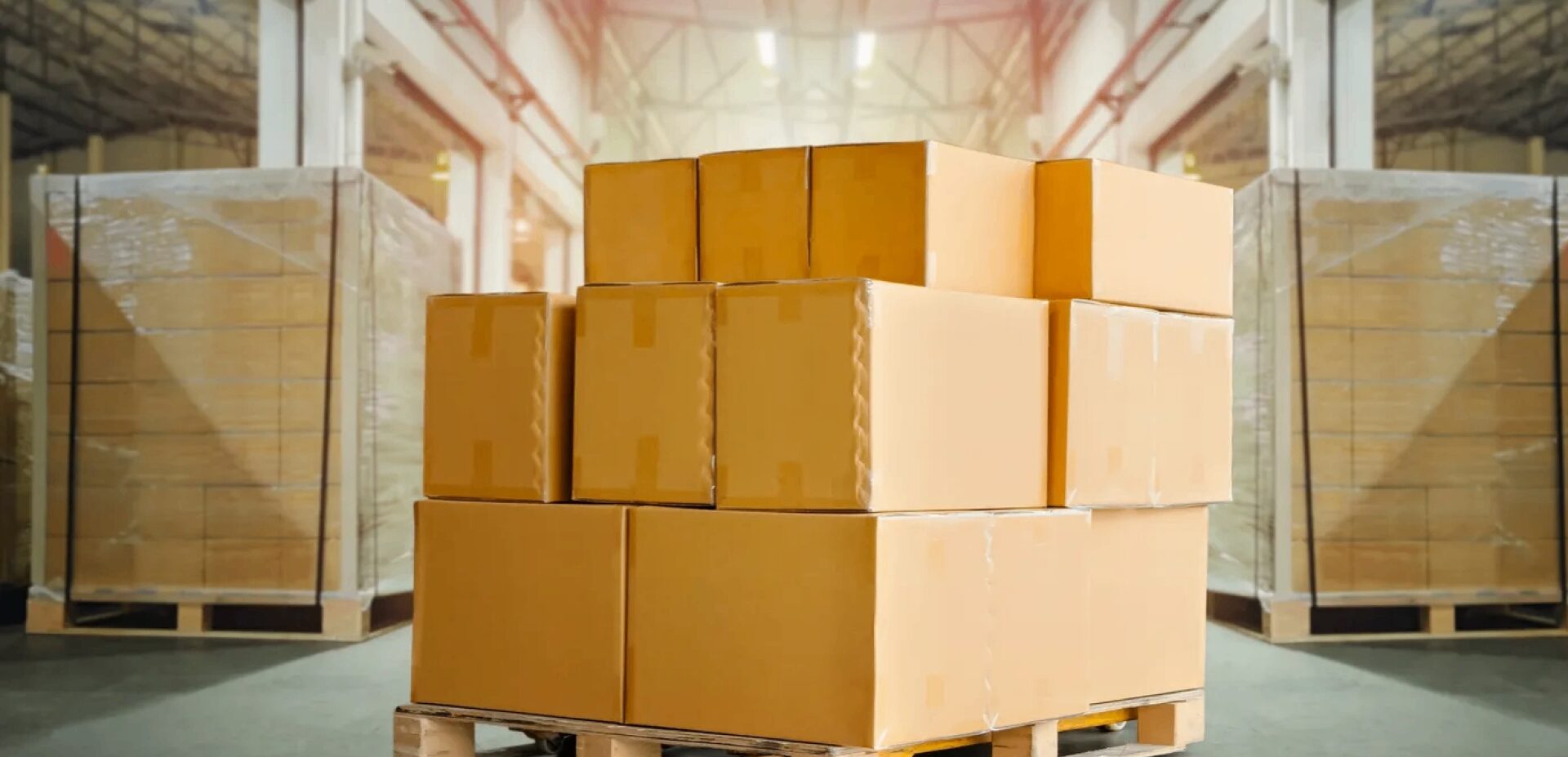 Stacked boxes on a pallet in warehouse.